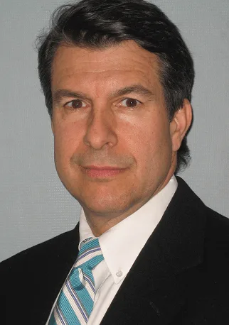 Photo of Dr. George J. Papasikos, D.MD., F.A.G.D, P.A.