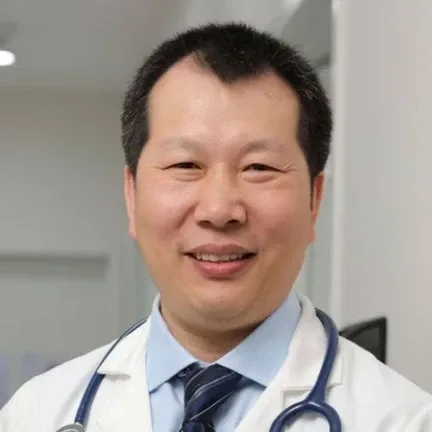 Photo of Dr. Guizhen Zhang, DDS