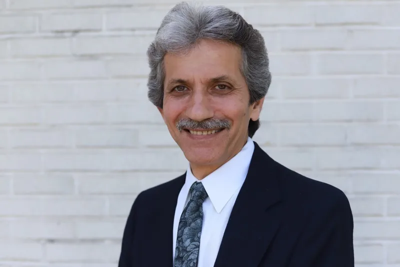 Dr. John Dimoulis