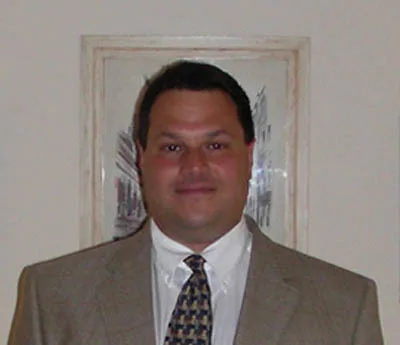 Photo of Dr. L. David Gassiraro, DMD