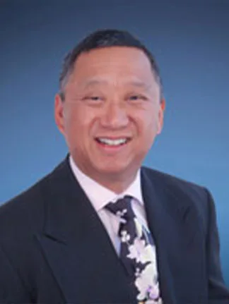 Photo of Dr. Russell Ek Chang, DDS MS FACD